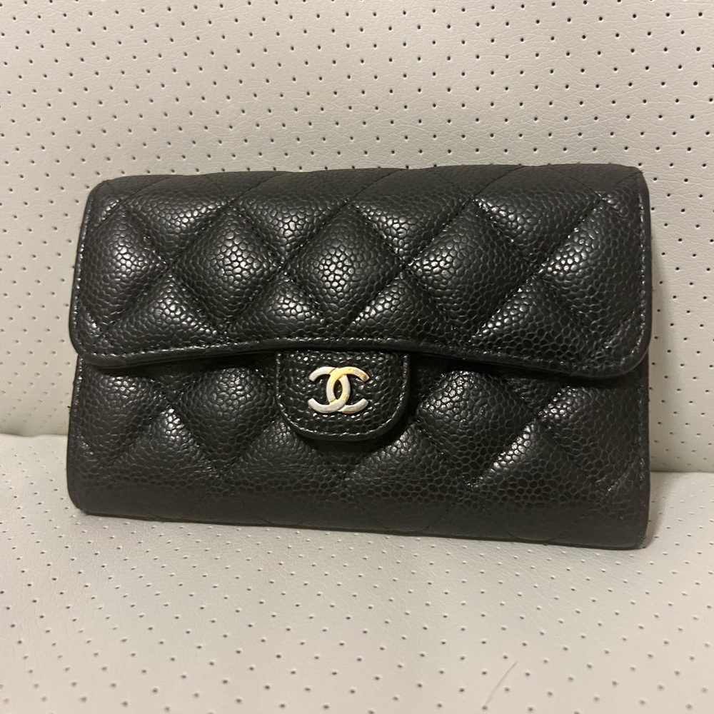 CHANEL Black Quilted Wallet with Gold Accent
